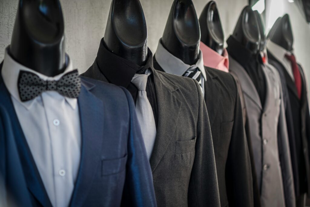 Close-up of mannequins adorned in elegant men
